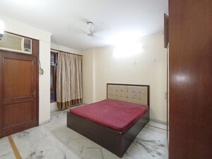 Bedroom in 3 BHK Builder Floor at Pamposh Enclave – for Rent