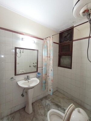 Bathroom in 3 BHK Builder Floor at Pamposh Enclave – for Rent