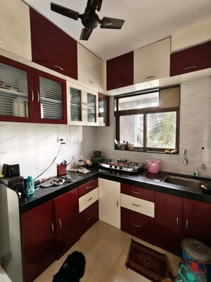 Kitchen in 2 BHK Apartment at Madhav Palacia, Ghodbunder Road – for Rent