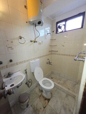 Bathroom in 2 BHK Builder Floor at Mehrauli – for Rent