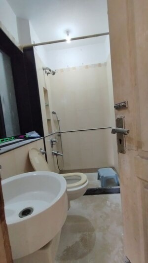 Bathroom in 3 BHK Apartment at Swapnalok Towers, Malad East – for Rent