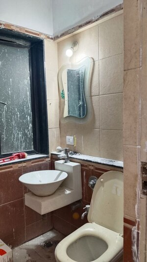 Bathroom in 3 BHK Apartment at Swapnalok Towers, Malad East – for Rent