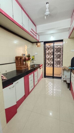 Kitchen in 3 BHK Apartment at Swapnalok Towers, Malad East – for Rent