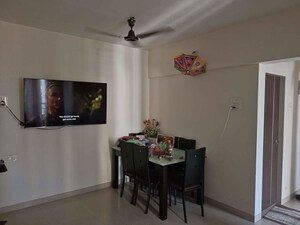 Living Room in 2 BHK Apartment at Ram Pushpanjali Residency, Owale – for Rent