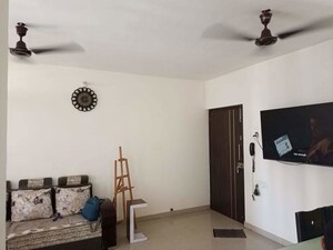 Living Room in 2 BHK Apartment at Ram Pushpanjali Residency, Owale – for Rent