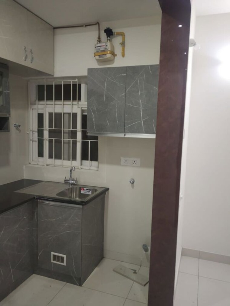 Kitchen, brigade-bricklane 1 Bedroom 663 Sq.Ft. Apartment In Jakkuru Bangalore 10672142