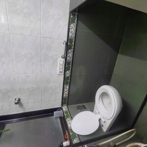 Attached Bathroom in 3 BHK Apartment at Lakshachandi Apartments, Gokuldham Colony – for Sale
