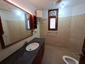 Bathroom in 3 BHK Builder Floor at Kalkaji – for Rent
