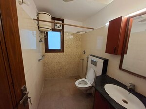 Bathroom in 3 BHK Builder Floor at Kalkaji – for Rent