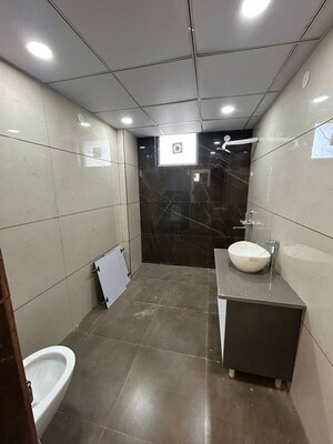 Bathroom in 4 BHK Builder Floor at Green Fields Colony – for Rent
