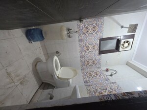 Bathroom in 2 BHK Builder Floor at Chattarpur – for Rent