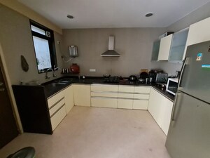 Kitchen in 3 BHK Apartment at Brahma Suncity Platinum, Wadgaon Sheri – for Rent