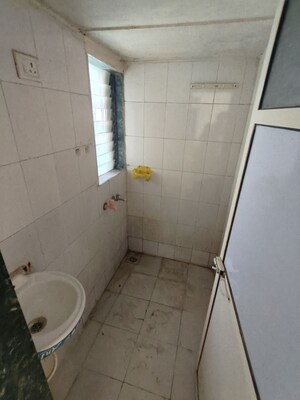 Bathroom in 1 BHK Apartment at Govinda Park, Morya Nagar – for Rent