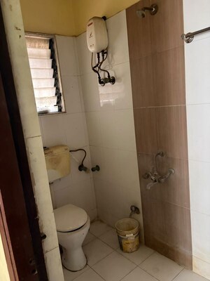 Bathroom in 2 BHK Apartment at Raunak Unnathi Greens, Kasarvadavali – for Rent