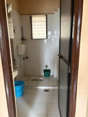 Bathroom in 2 BHK Apartment at Raunak Unnathi Greens, Kasarvadavali – for Rent
