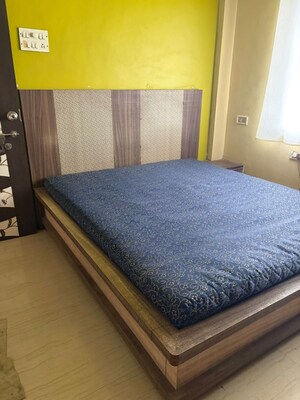 Bedroom in 2 BHK Apartment at Raunak Unnathi Greens, Kasarvadavali – for Rent