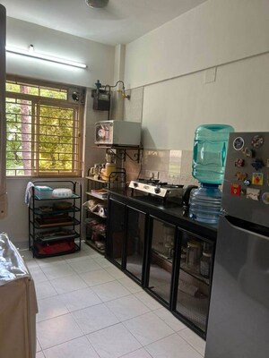 Kitchen in 1 BHK Apartment at Anand Villa Khar, Khar West – for Rent