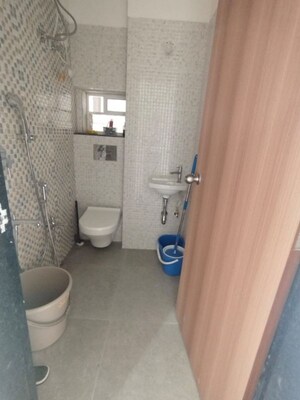 Bathroom in 1.5 BHK Apartment at Atmiya Centria, Santacruz East – for Rent