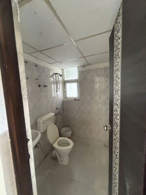 Bathroom in 3 BHK Apartment at MGI Gharaunda, Raj Nagar Extension – for Rent