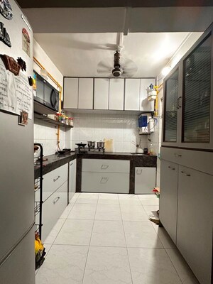 Kitchen in 3 BHK Apartment at Om Shanaaz Apartments, Andheri West – for Rent