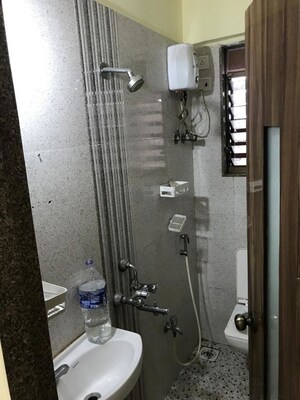 Bathroom in 1 BHK Apartment at Dheeraj Solitaire, Malad West – for Rent