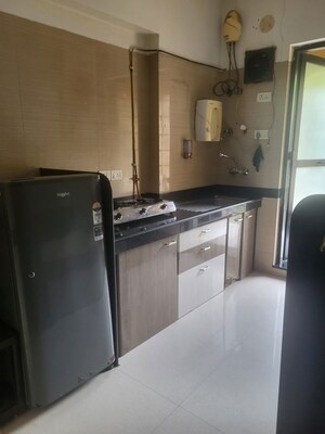 Kitchen in 2 BHK Apartment at DGS Sheetal Anupam, Malad West – for Rent