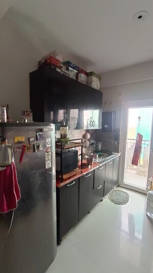 Kitchen in 2.5 BHK Apartment at Saviour Park, Mohan Nagar – for Sale