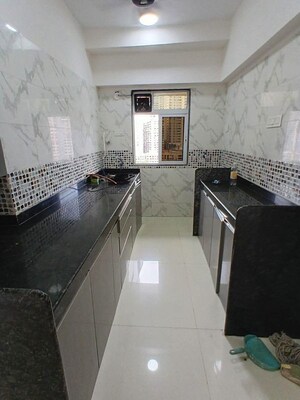 Kitchen in 1 BHK Apartment at DGS Sheetal Tapovan, Malad East – for Rent
