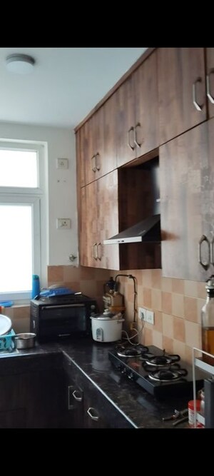 Kitchen in 3.5 BHK Apartment at Great Value Sharanam, Sector 107 – for Rent
