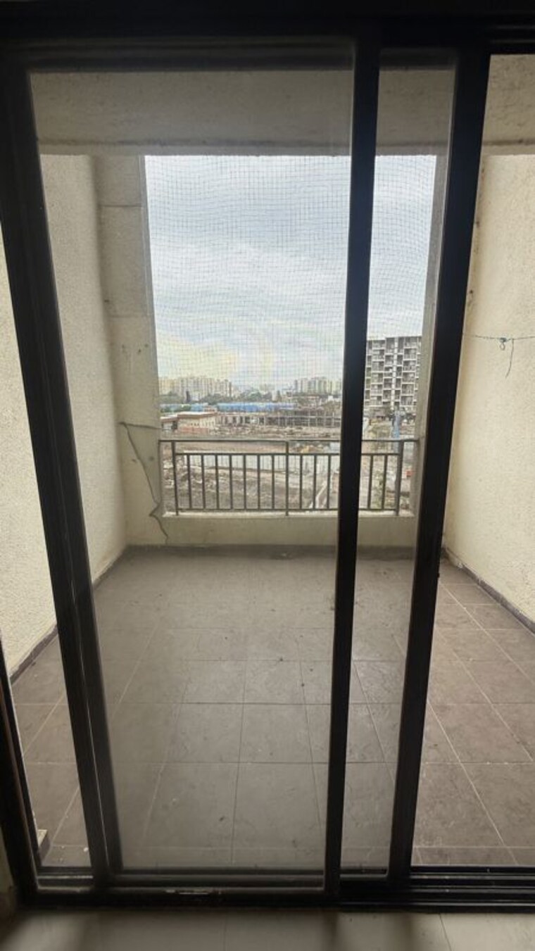 Balcony, majestique-city 2 Bedroom 658 Sq.Ft. Apartment In Wagholi Pune 10673079