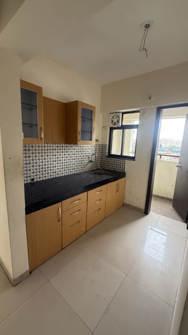 Kitchen, majestique-city 2 Bedroom 658 Sq.Ft. Apartment In Wagholi Pune 10673079