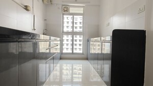 Kitchen in 2 BHK Apartment at Godrej Emerald, Ghodbunder Road – for Rent