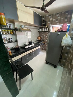 Kitchen in 2 BHK Apartment at Spring Fields Apartment, Kothrud – for Rent