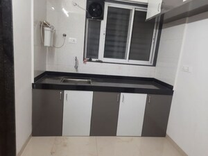 Kitchen in 2 BHK Apartment at Dahanukar Colony – for Rent