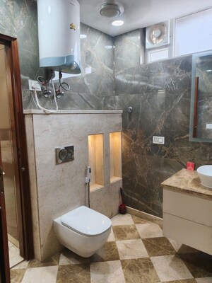 Bathroom in 4 BHK Builder Floor at Panchsheel Enclave – for Sale
