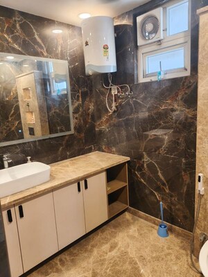 Bathroom in 4 BHK Builder Floor at Panchsheel Enclave – for Sale