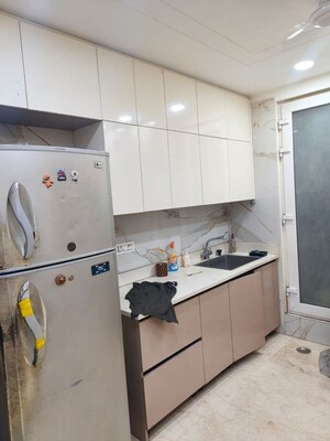 Kitchen in 4 BHK Builder Floor at Panchsheel Enclave – for Sale