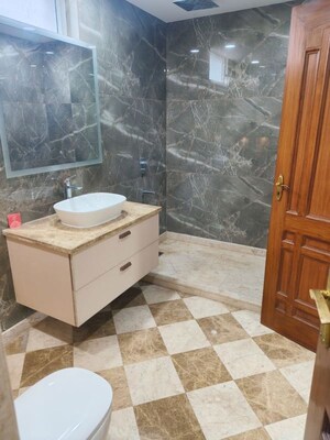 Bathroom in 4 BHK Builder Floor at Panchsheel Enclave – for Sale