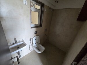 Bathroom in 1 BHK Apartment at Suraj Heritage, Owale – for Rent