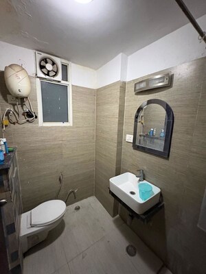 Bathroom in 2 BHK Apartment at Nilaya Greens, Raj Nagar Extension – for Rent