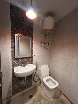 Bathroom in 1 BHK Builder Floor at Freedom Fighters Enclave – for Rent