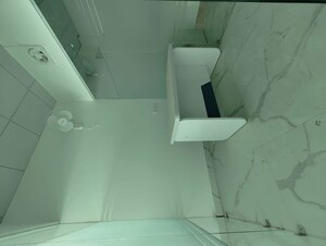 Bathroom in  Office Space at DAH Greentech NX One, Tech Zone 4 Greater Noida – for Rent