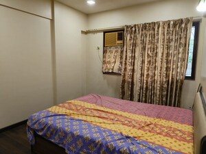 Bedroom in 2 BHK Apartment at Vasant View, Malad West – for Rent