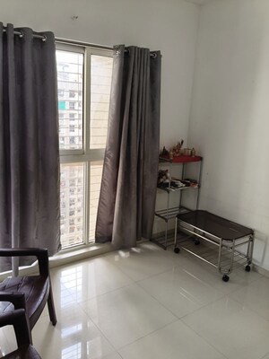 Living Room in 2 BHK Apartment at Lodha Amara, Kolshet Road – for Rent