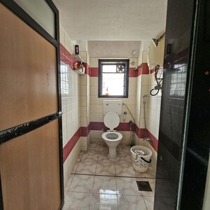 Bathroom in 2 BHK Apartment at Lok Puram, Vasant Vihar – for Rent