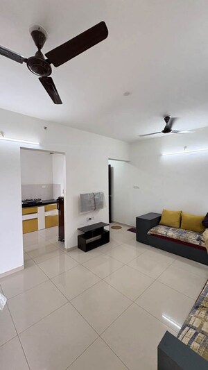 Living Room in 2 BHK Apartment at Shapoorji Pallonji Joyville Hinjewadi, Hinjewadi – for Rent
