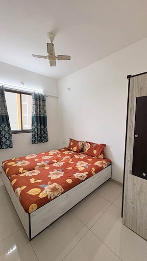 Bedroom in 2 BHK Apartment at Shapoorji Pallonji Joyville Hinjewadi, Hinjewadi – for Rent