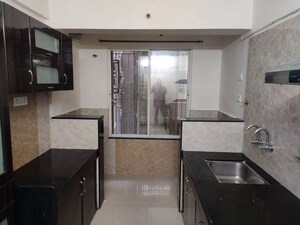 Kitchen in 2 BHK Apartment at Atlanta Society, Wakad – for Rent