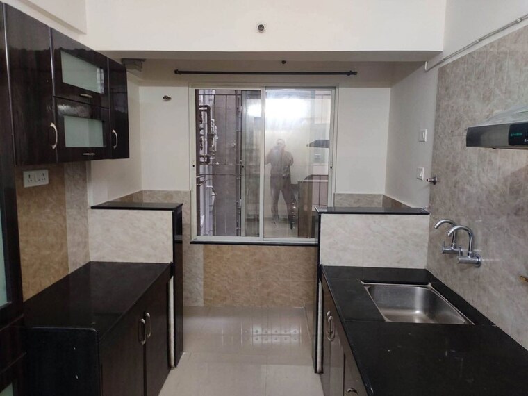 Kitchen, atlanta-society 2 Bedroom 825 Sq.Ft. Apartment In Wakad Pune 10673634