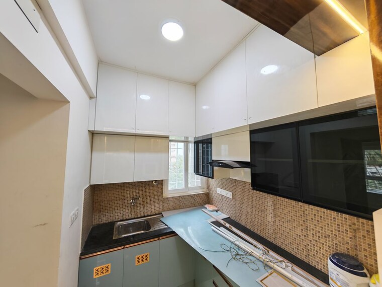 Kitchen, olympia-opaline-crystal-and-diamond 1 Bedroom 602 Sq.Ft. Apartment In Navallur Chennai 10657398